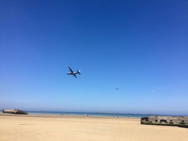 Plane over Arromanches Beach